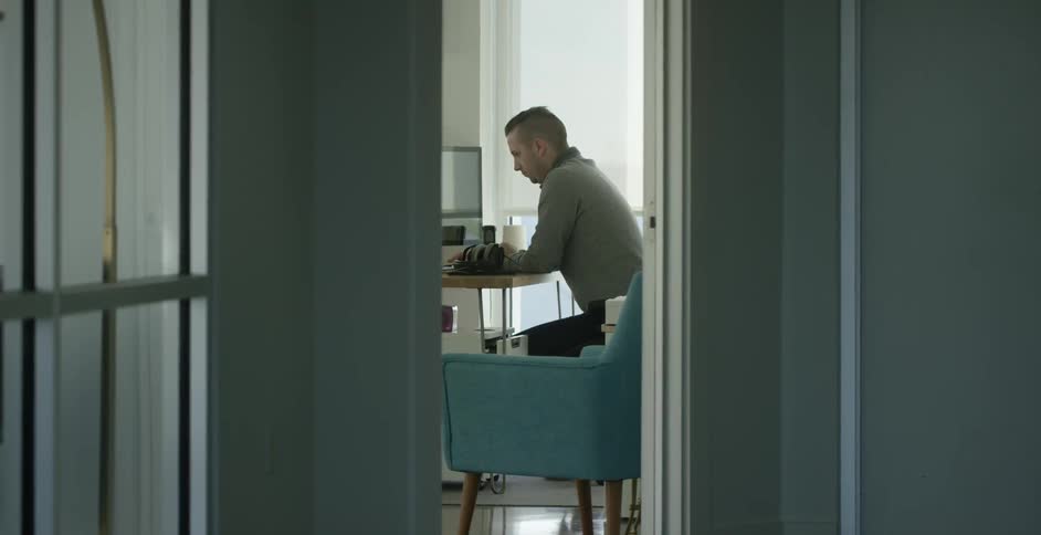 A man sitting at a desk