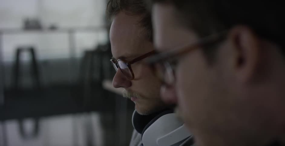 Men are working in the office