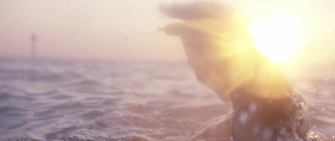 A woman is  swimming