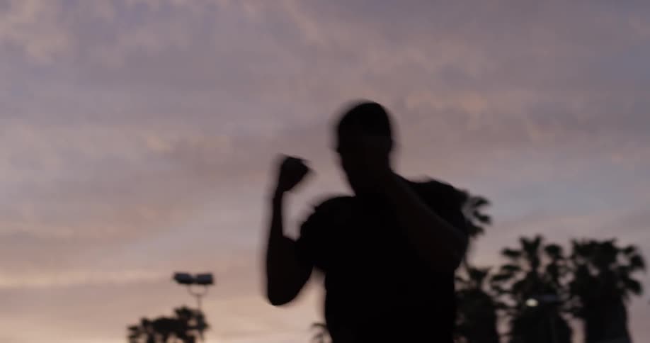 A man making fast jabbing movements