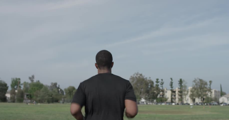 Man running outside in the afternoon