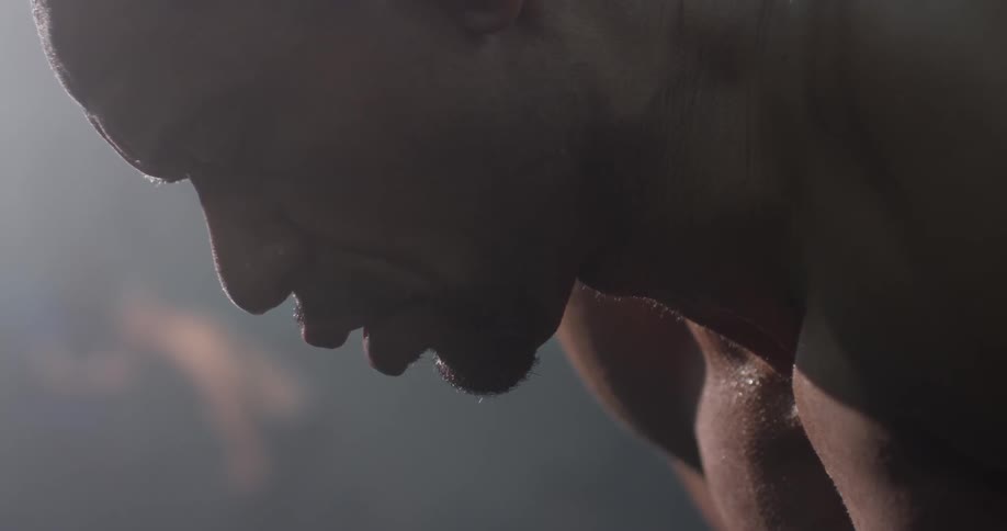 Man breathing heavily at the gym