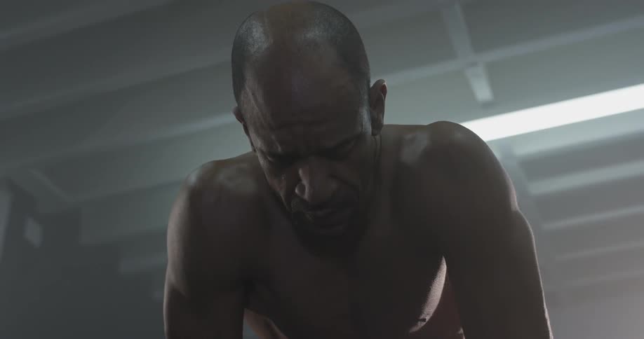 A man bending over in exhaustion