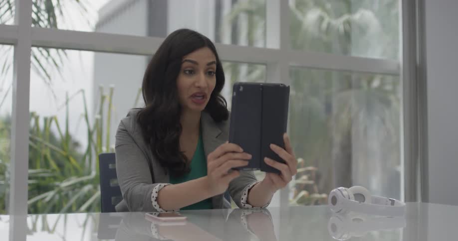 A woman is talking to someone on a phone