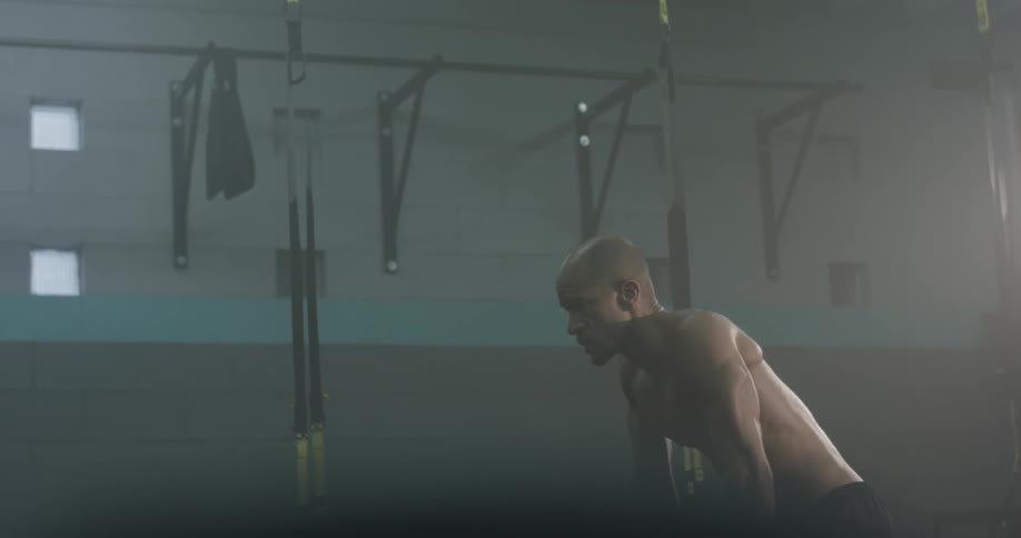 A man is working out in a gym