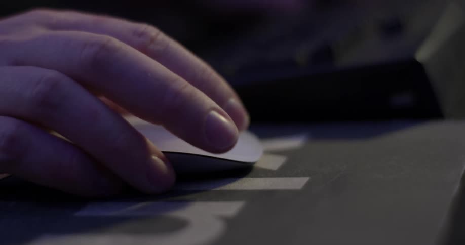 A man using a computer in a studio