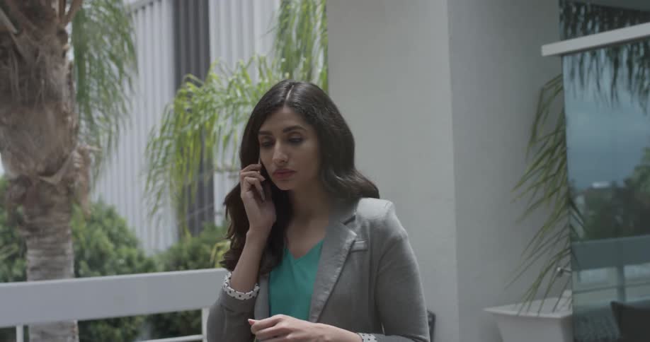 A woman that is talking on a cell phone