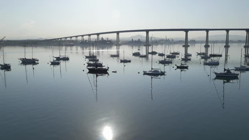 Boats floating on a body of water