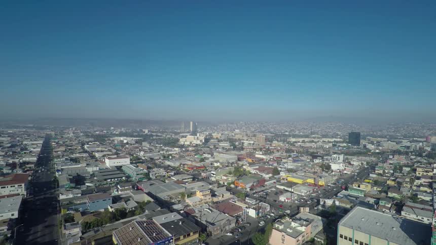 Aerial view of a midsize city on a clear day aerial view of a midsize city on a clear day