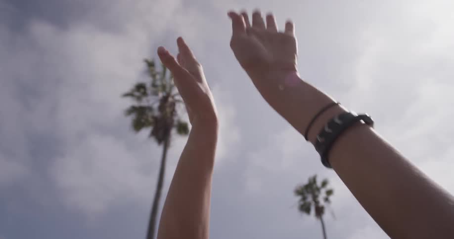 Hands are waving in the air