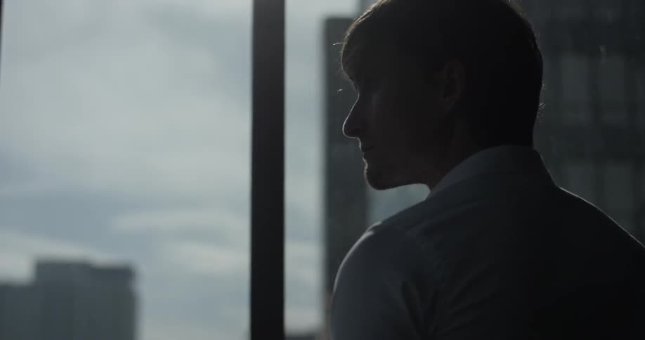 A man is looking at the city