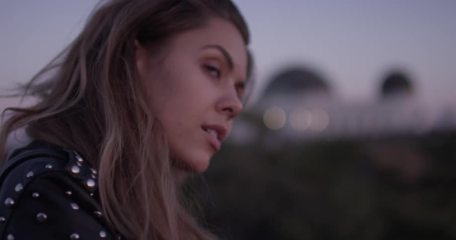 Woman Looking At Scenic View At Sunset