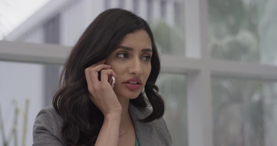 Woman answering a cell phone