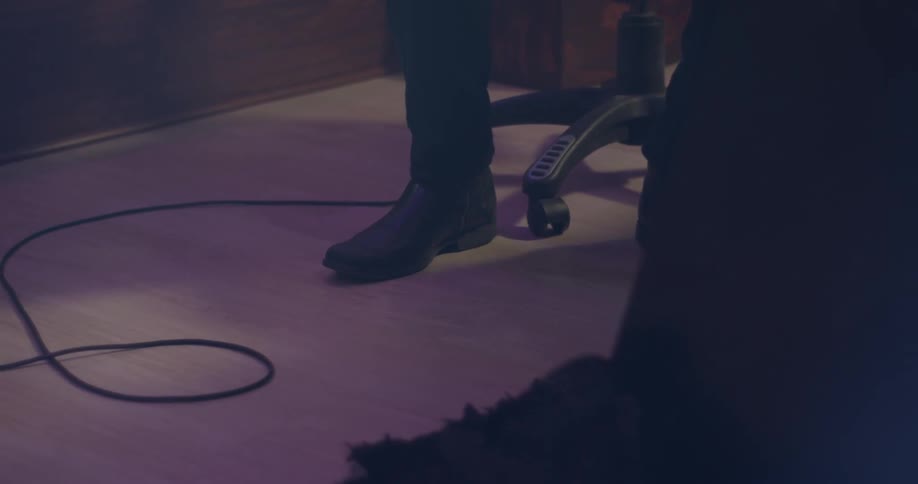 Foot taps in time to music