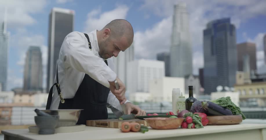 Chef Cooking In Kitchen