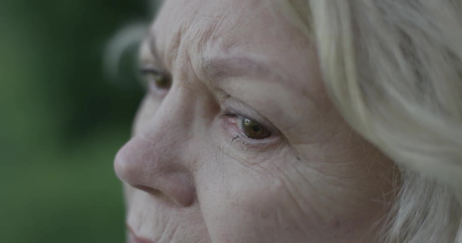 Woman looks off at something