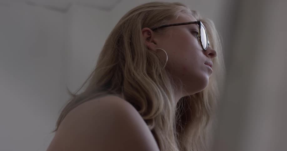 A woman wearing glasses in drawing
