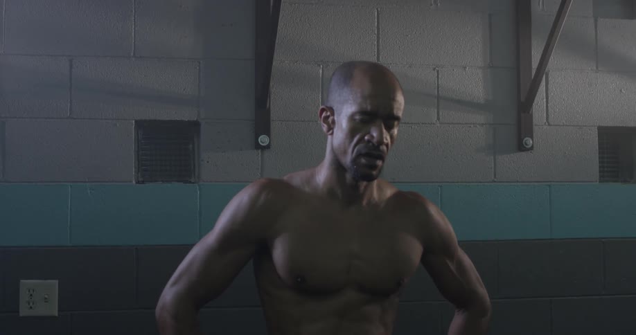 A man exhales to catch his breath