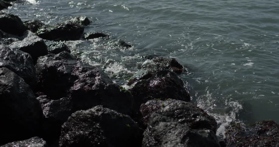 Water is crashing among the rocks