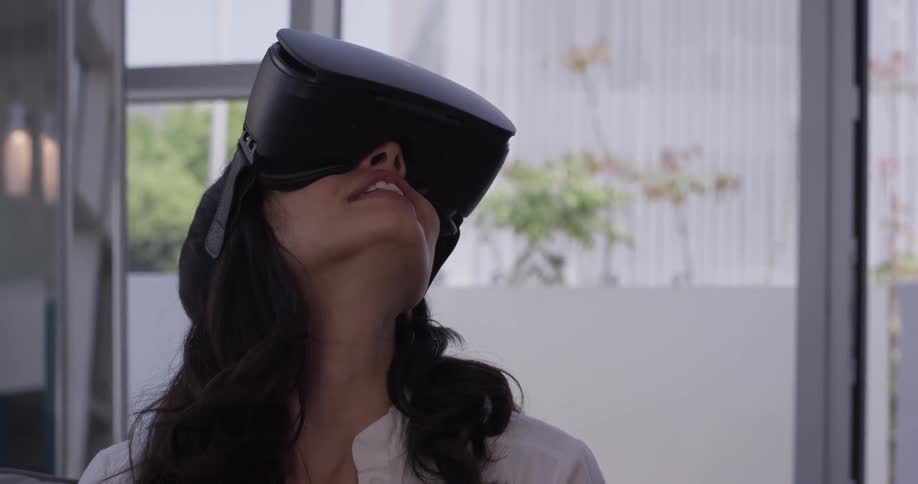 Woman looks in vr glasses