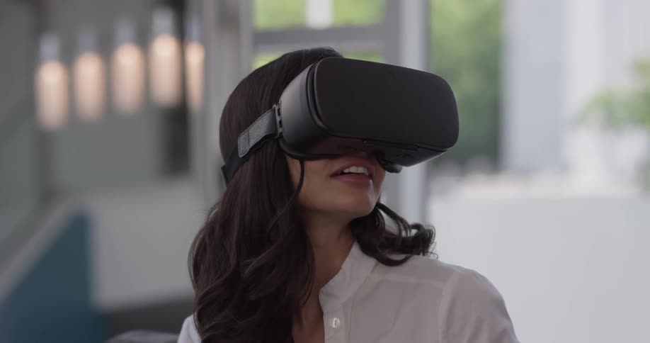 Woman In Apartment Using Electronics