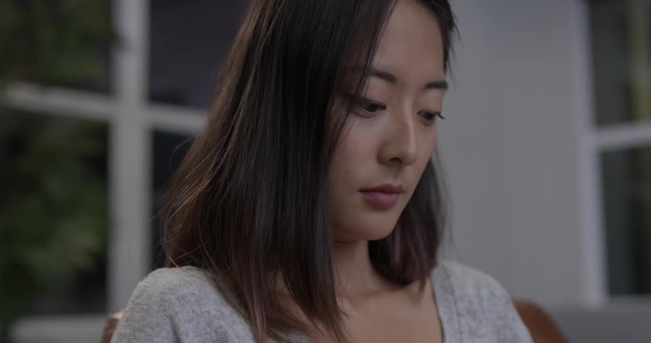 Woman reading something that is in front of her