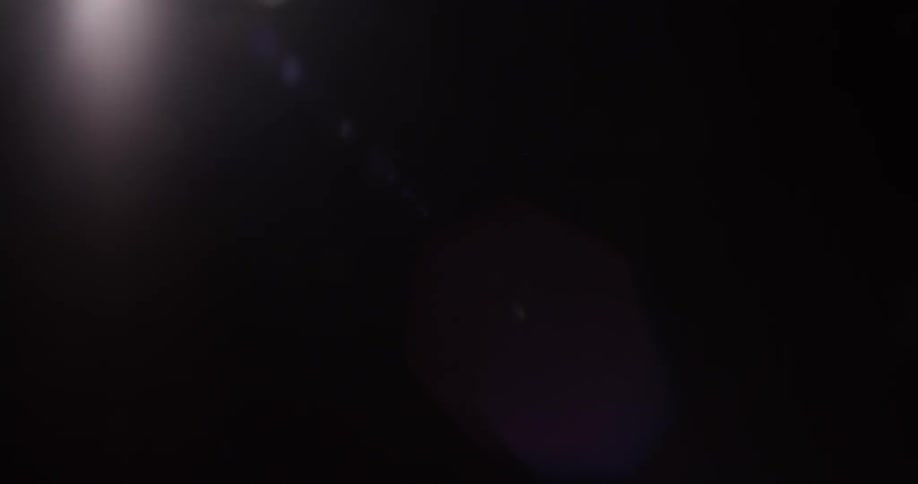 A light shines into a dark area