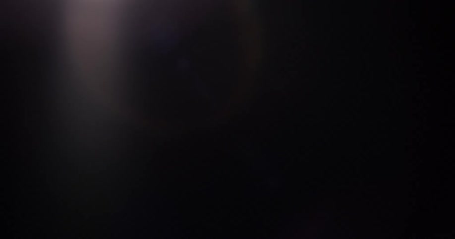 A dark room slowly begins to lighten