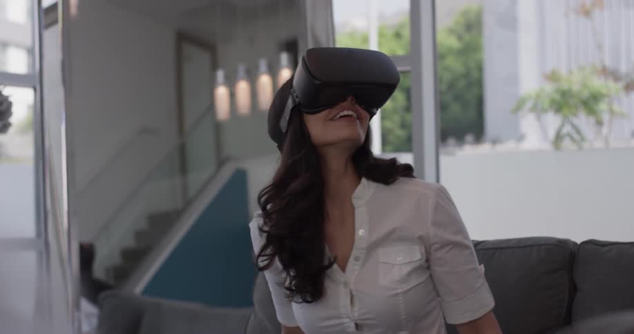 Woman looking at a vr headset