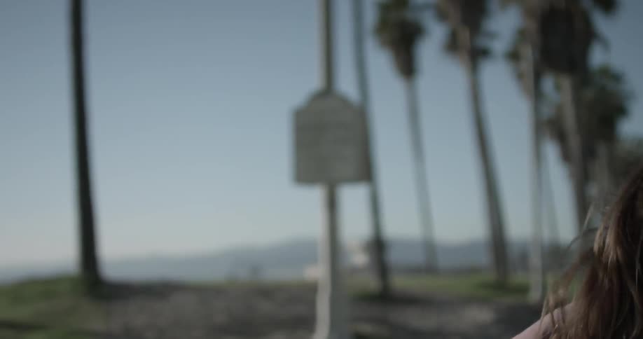 A woman is jogging in the city