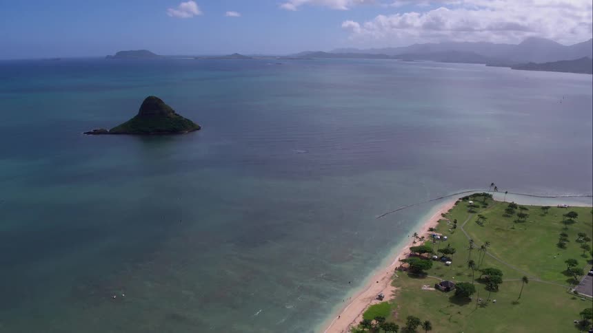 An overview of the ocean with rock islands