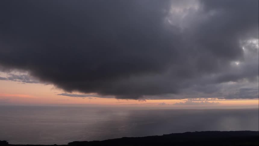 Large dark clouds fill the sky