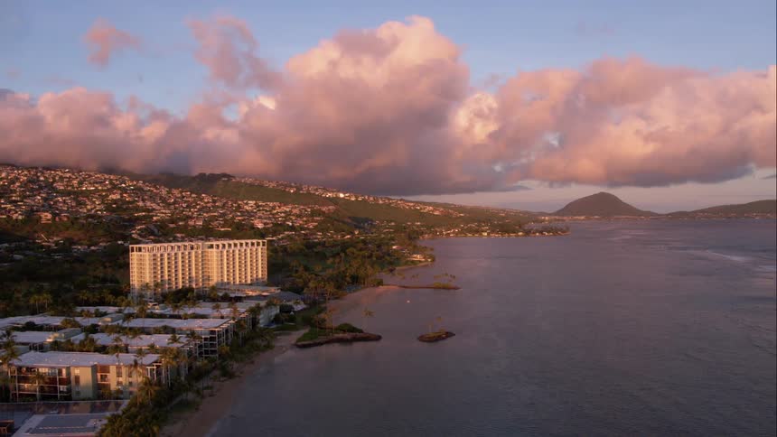 Aerial sweep of a coastal resort area