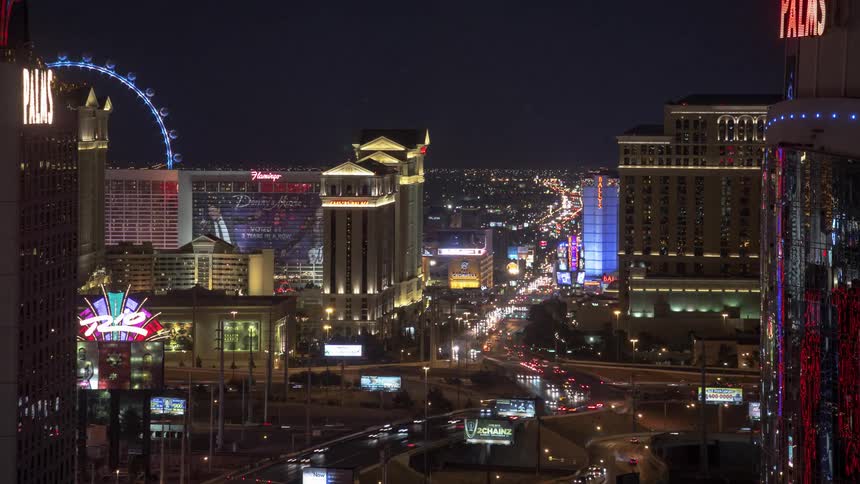 Headlights and taillights of vehicles moving through the city streets