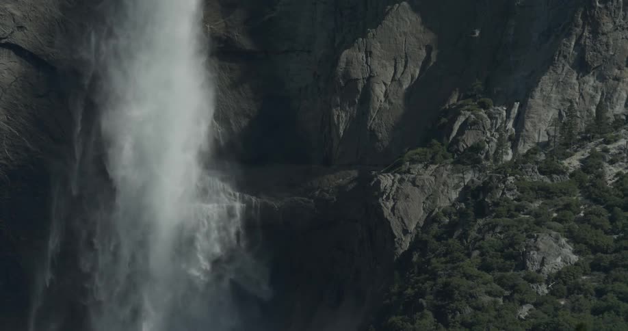 Water cascading down a rocky cliffside