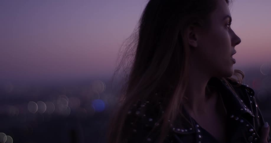 Woman Looking At Scenic View At Sunset