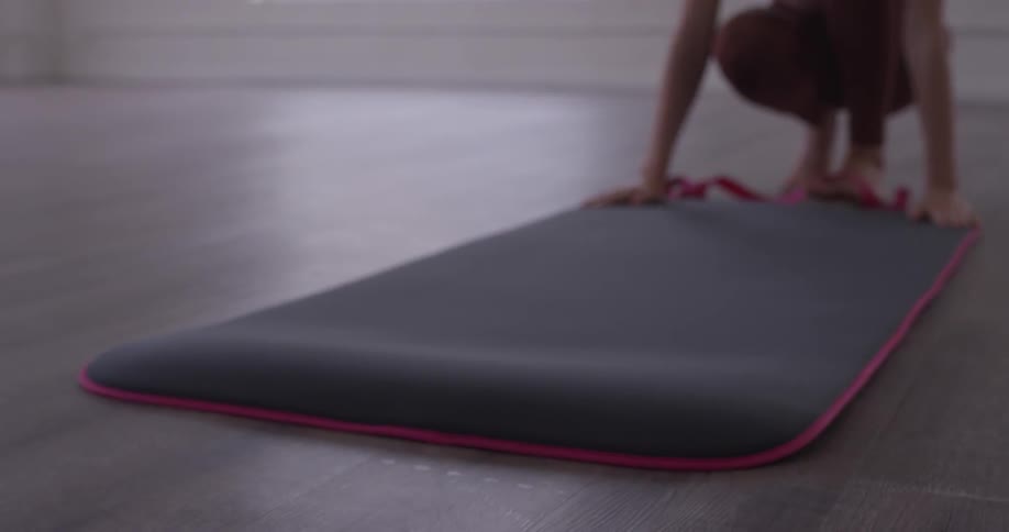 Woman Doing Yoga In Empty Building