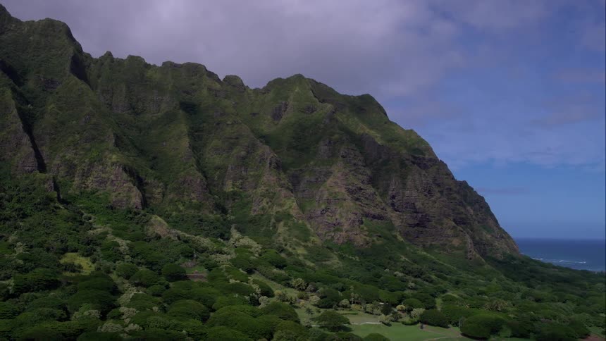 Craggy mountain borders sea