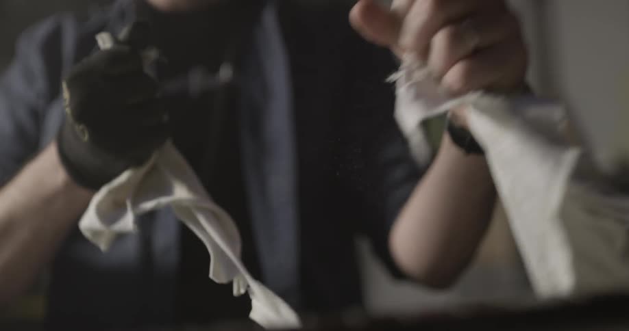 Man Making Guitar In Workshop