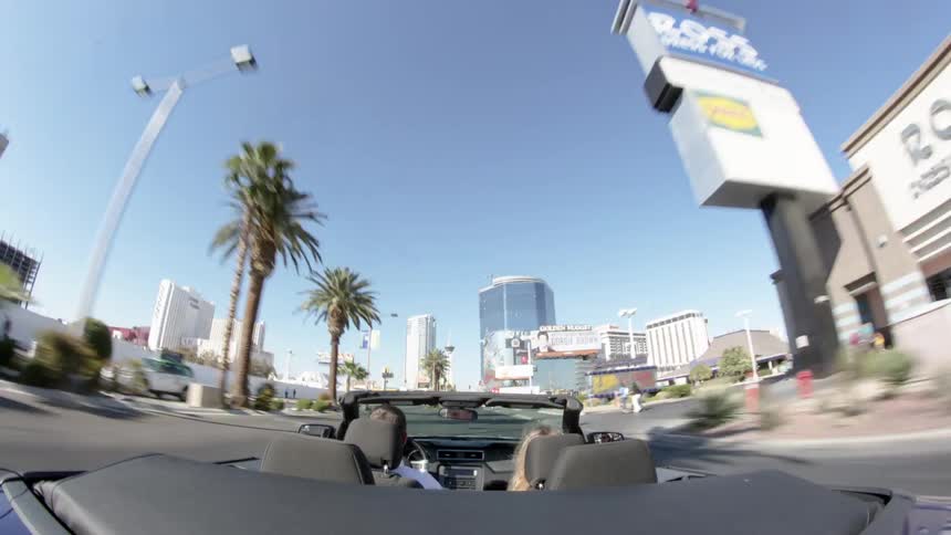 A vehicle moving through the city streets