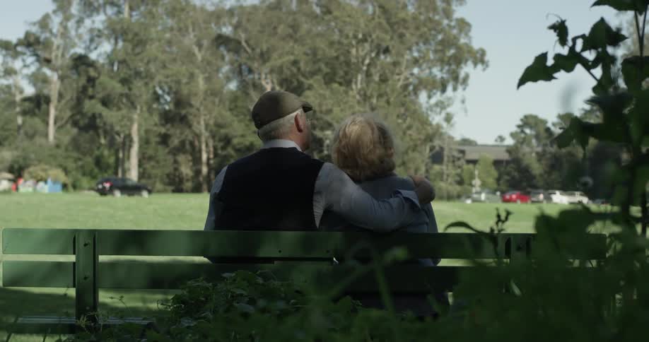 A woman and man are holding each other