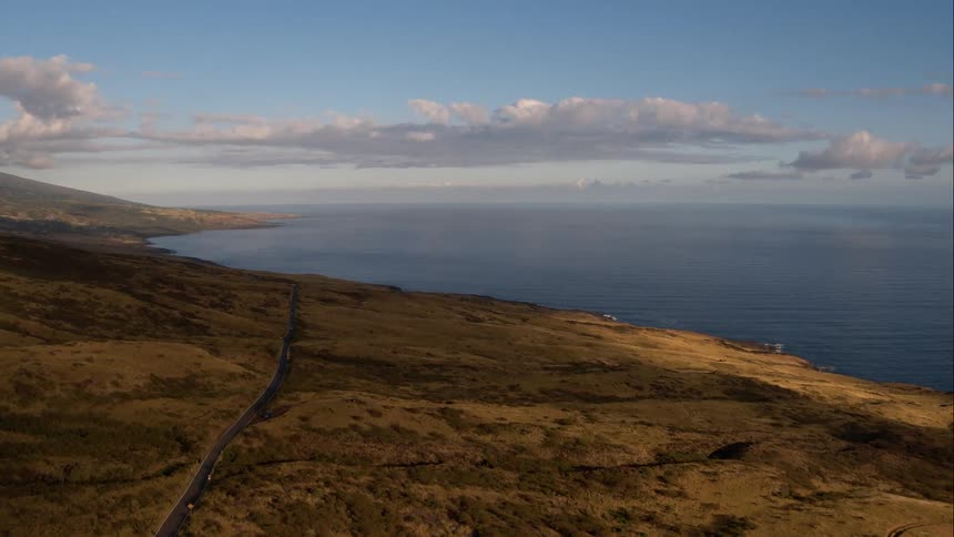 A single road cuts through the vast plains