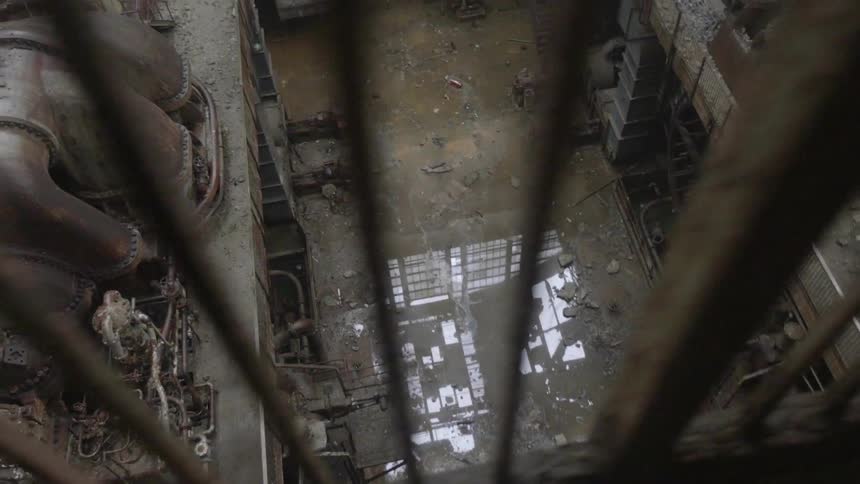 The flooded floor of an abandoned building
