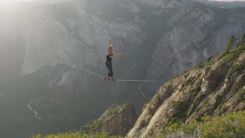 A person walking on a tightrope