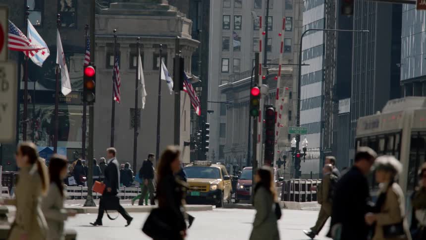 Pedestrians crossing a busy street