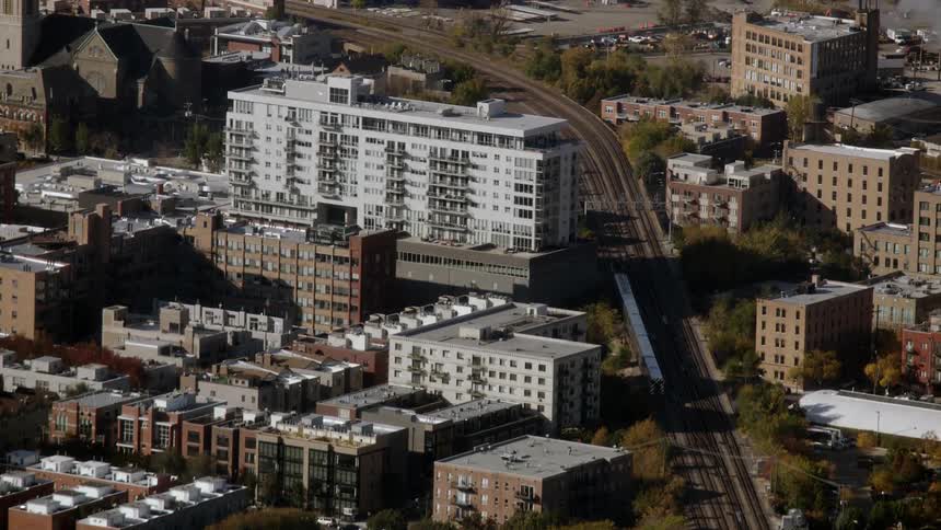 A road is shown in a city