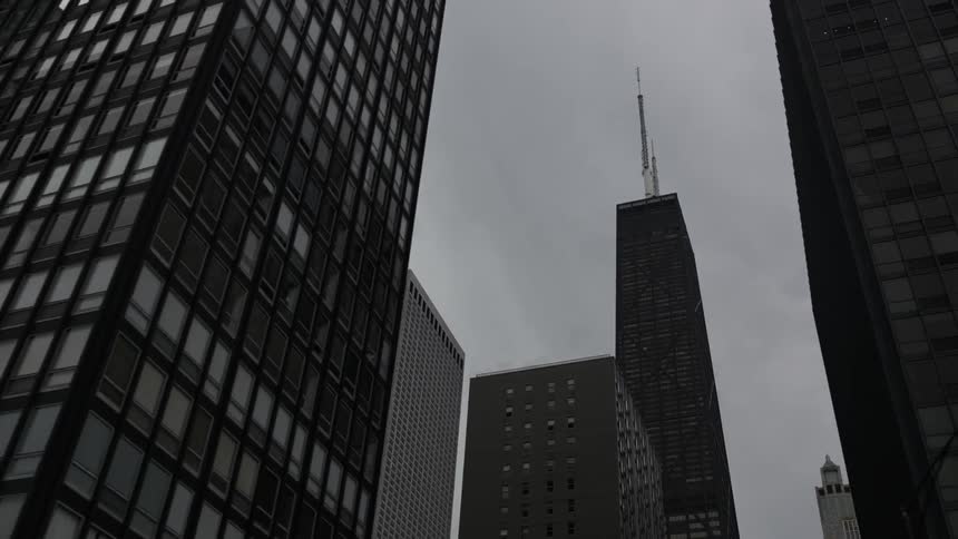 Looking up at city buildings