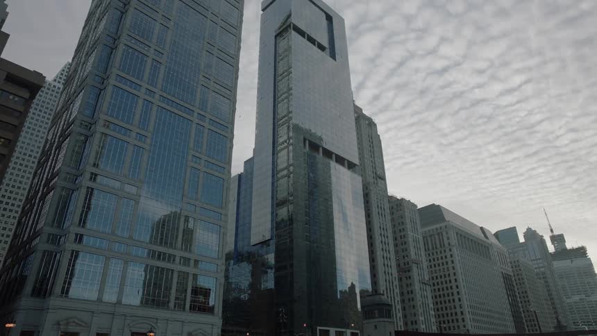 View of tall buildings under a cloudy sky