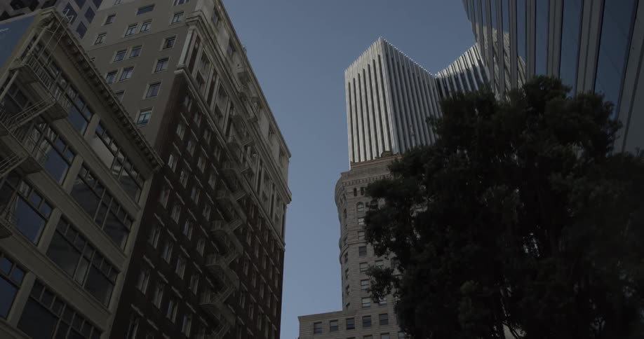 Tall buildings draw closer in a crowded city center
