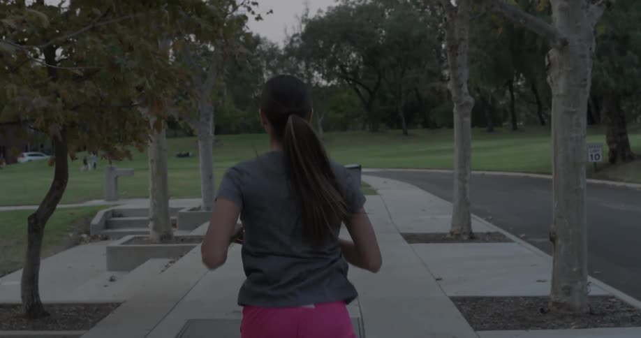 A woman jogs outside
